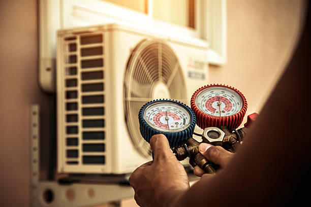 Professional Air Conditioning Service technician working in Timberville, VA